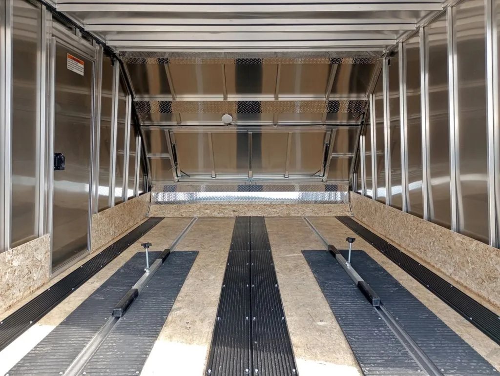 Mission Trailers Aluminum Crossover – Rear Canopy – Wide interior view looking forward showing wood walls and aluminum framing