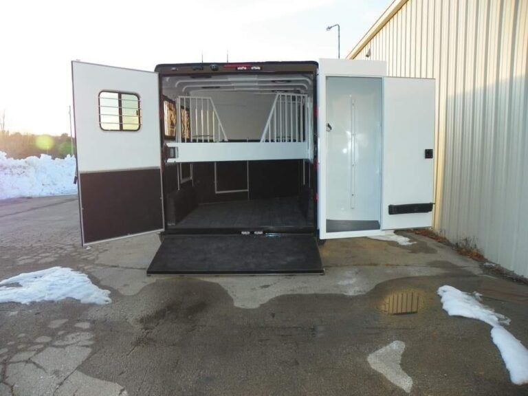 2022 Double D 2 Horse Bumper Pull – Reverse Slant – Rear view of trailer with double doors and ramp fully open to interior