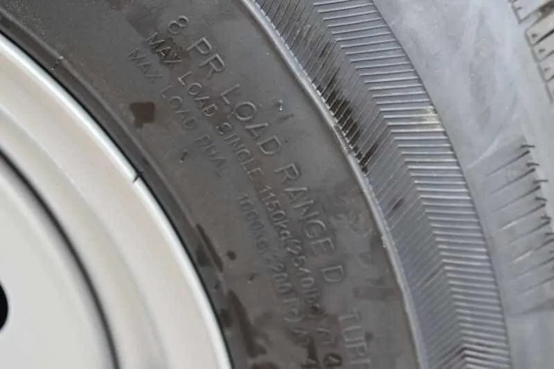 2019 Trailers USA 2 Horse Trailer – Aluminum, Dressing Room – Close-up of tire sidewall showing load range and weight capacity information