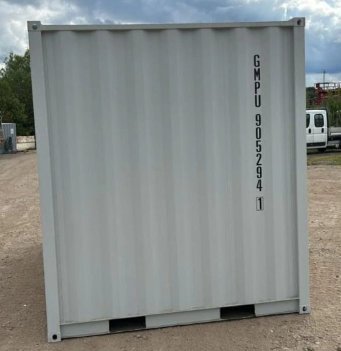 9ft Container Office – Side Entry and Barred Window – straight-on exterior view of plain corrugated container end wall