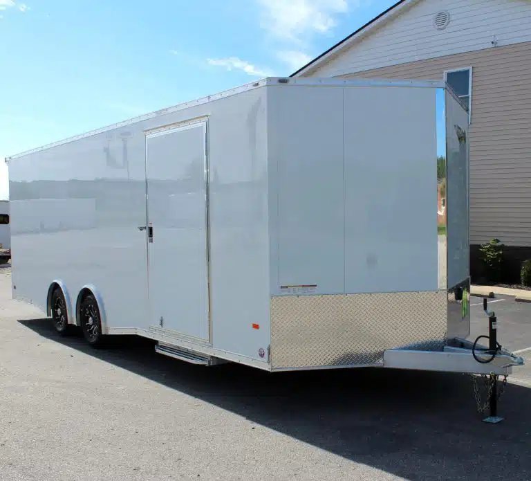 2026 Millennium 24 ft Car Hauler – White Blaze – Side view of the white enclosed trailer showing the side entrance door