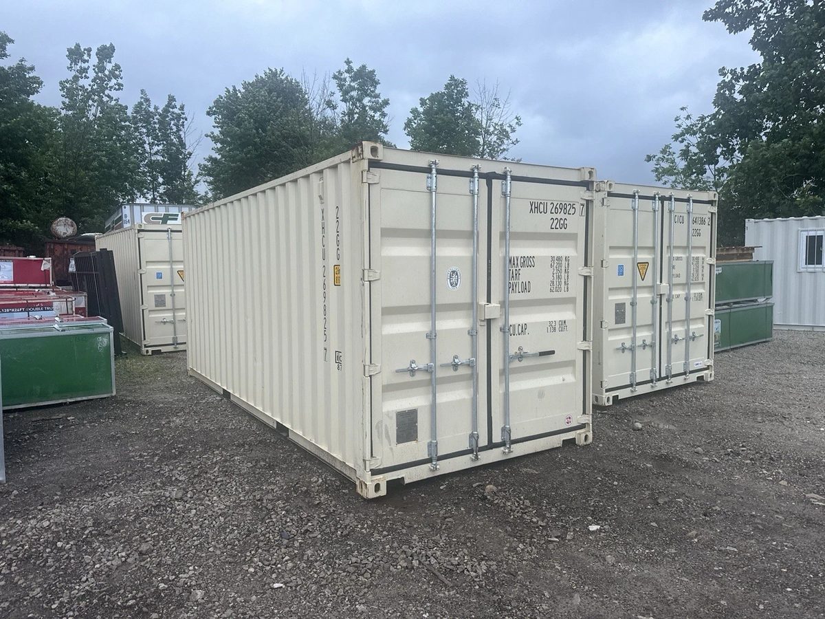 20ft One-Trip Shipping Container – Full-Length Side Doors – three-quarter exterior view of cream container with cargo doors closed