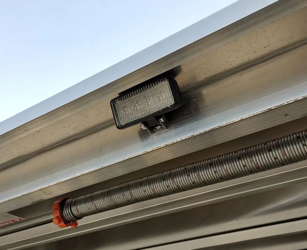 Mission Trailers Aluminum Crossover – Rear Canopy – Close-up of a rectangular LED loading light mounted under the rear canopy