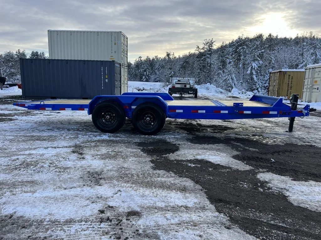 2024 Rice Trailers 20 ft Tilt Trailer – Spare Mount – Full side profile view from the left side showing the trailer frame and axles