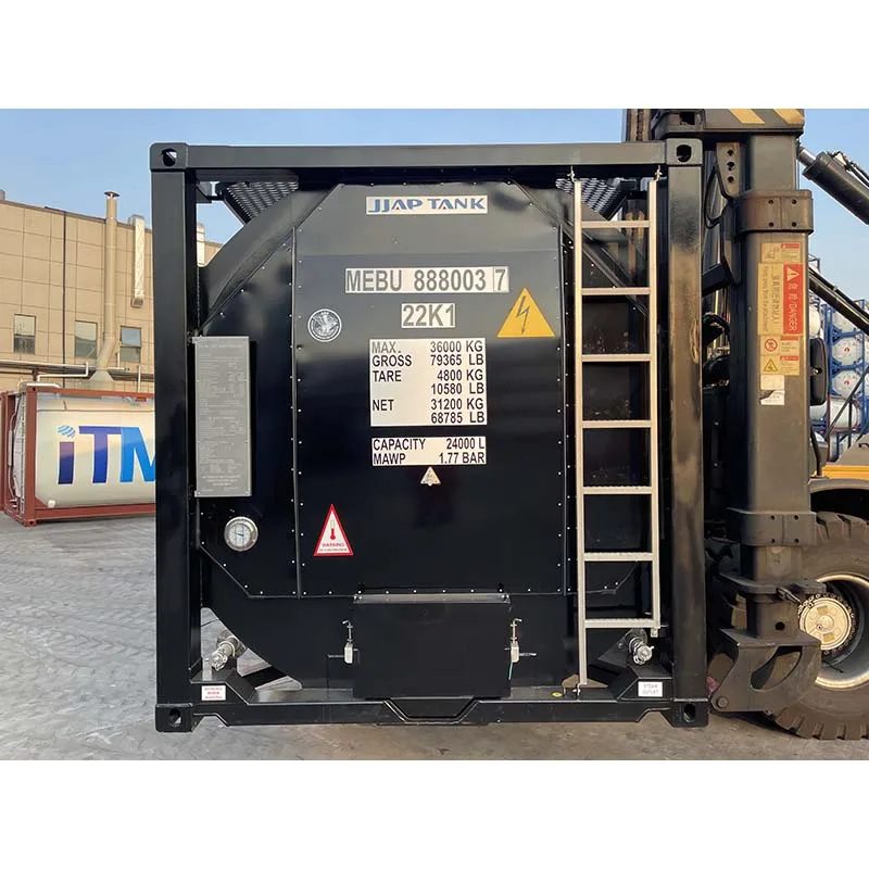 20ft Carbon Steel Tank Container – Liquid Storage and Transport – black tank container end with ladder beside lifting equipment
