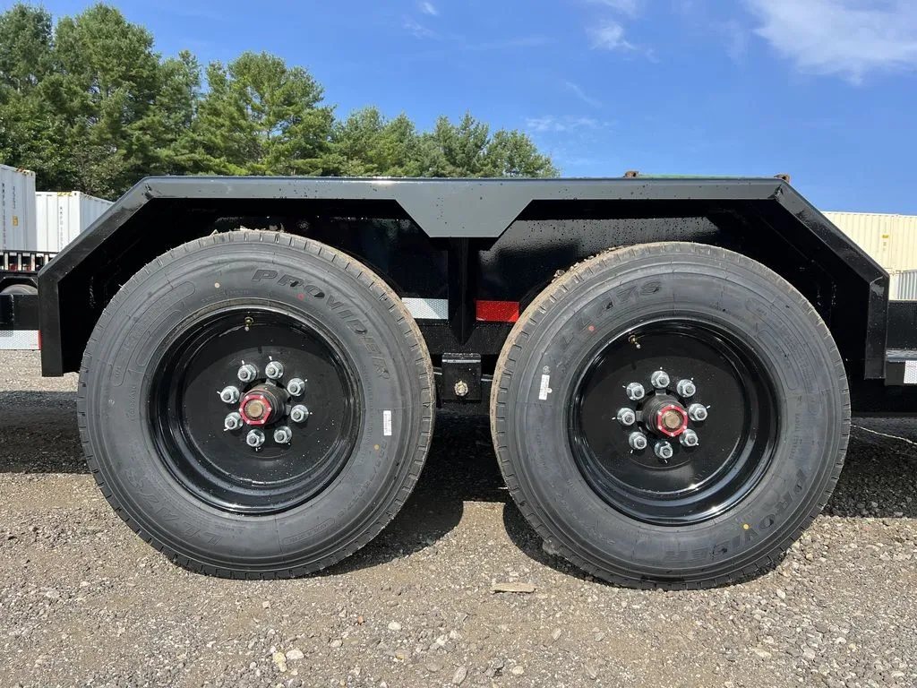 2024 Rice Trailers 20 ft Tilt Deck – Spare Mount – Close-up view of the dual wheels, tires, and black fenders