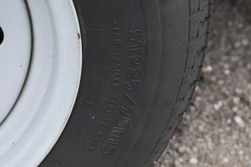2013 Shadow 2HSL 2 Horse Trailer – Aluminum, Dressing Room – Macro shot of the tire sidewall showing the size and load rating text