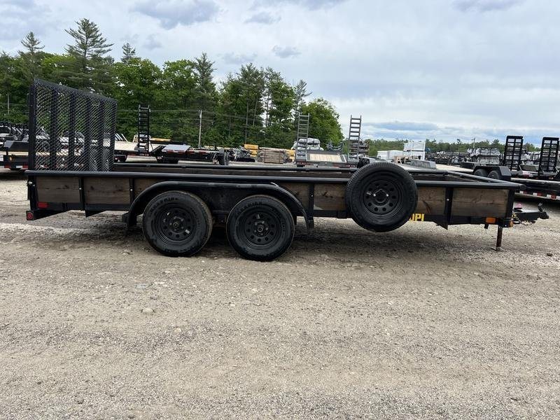 2021 Big Tex 16 ft Utility Trailer – Ramp Gate & Spare – Full side view of the trailer showing the mounted spare tire on the rail