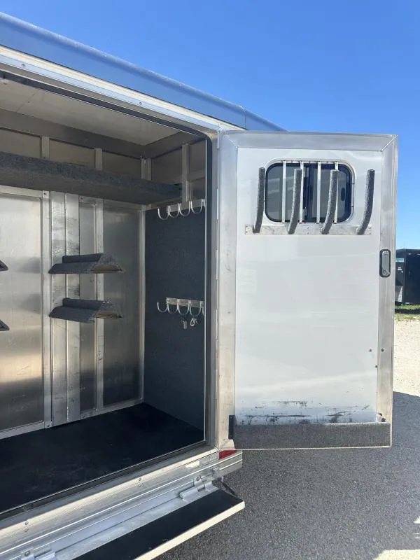 2020 Bloomer 4 Horse Stock Combo – Trainer Tack – Inside the tack room showing bridle hooks and saddle rack mounts
