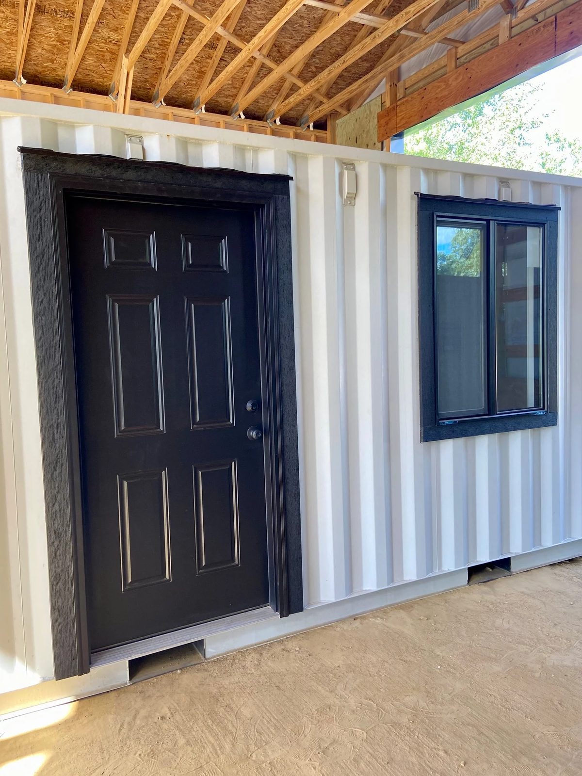20ft Modular Container Office – LED Lighting, Two Windows – white container office with black entry door and window (7)