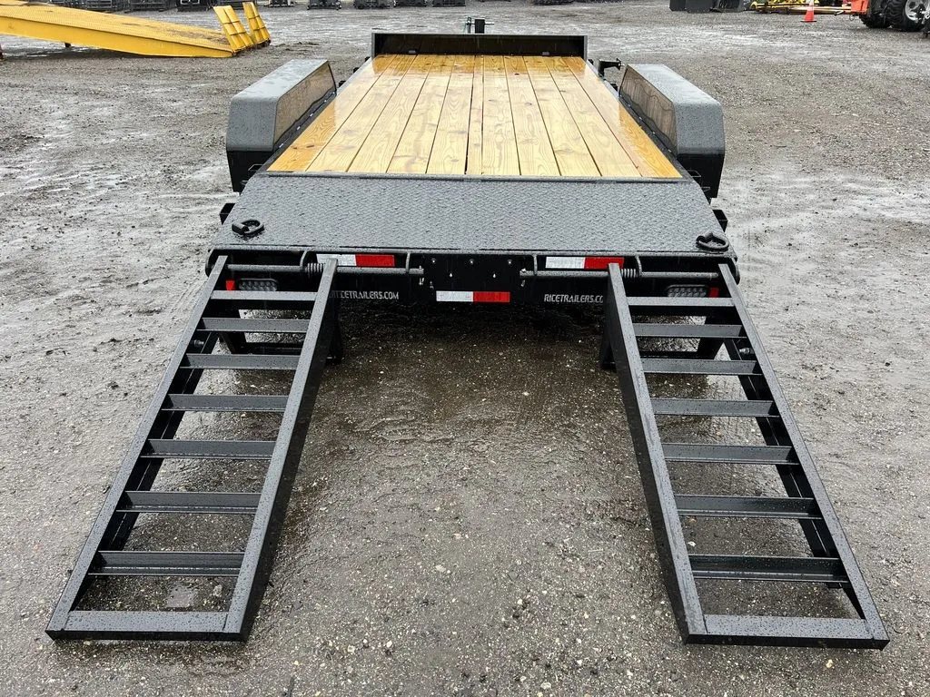 2024 Rice Trailers 16 ft Equipment Trailer – Toolbox – Rear view showing the wooden deck and two black metal ramps lowered to the ground