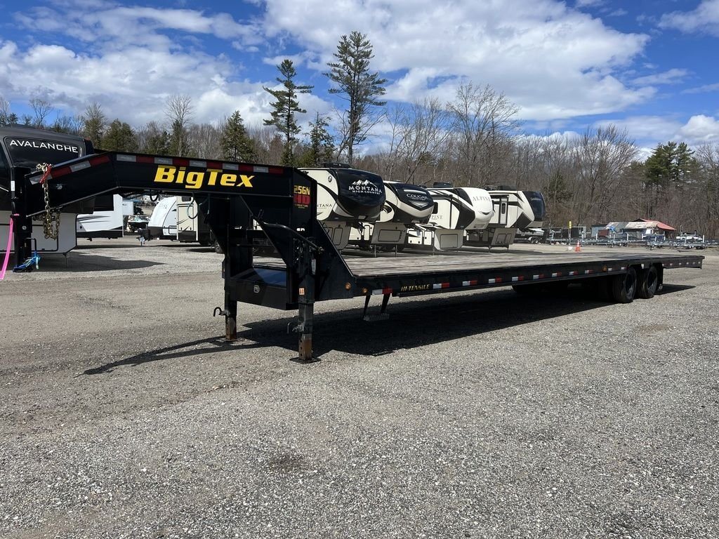 2023 Big Tex 40 ft Equipment Trailer – Slide-Out Ramps – Full side profile view of the long gooseneck equipment trailer on gravel