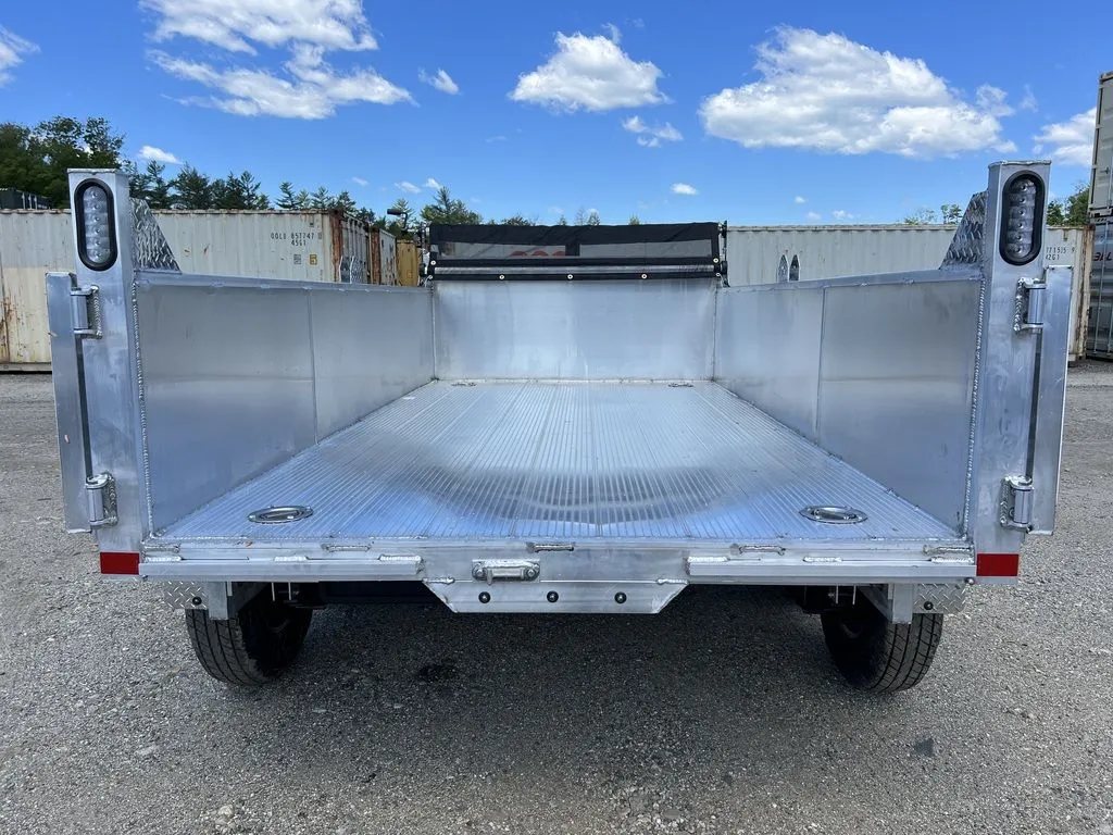 2024 Cargo Pro 12 ft Dump Trailer – Aluminum – Wide view of the flat aluminum floor inside the trailer bed