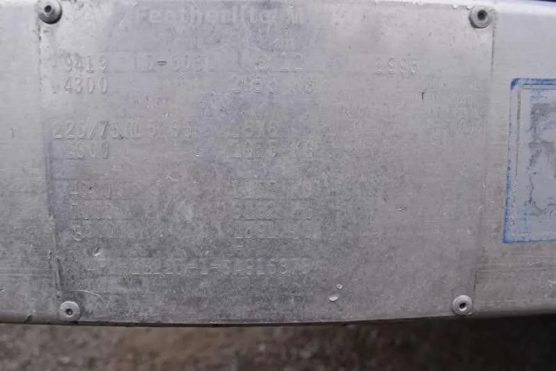 1995 Featherlite 2 Horse Trailer – Aluminum, Dressing Room – Close-up of the metal manufacturer identification and VIN plate