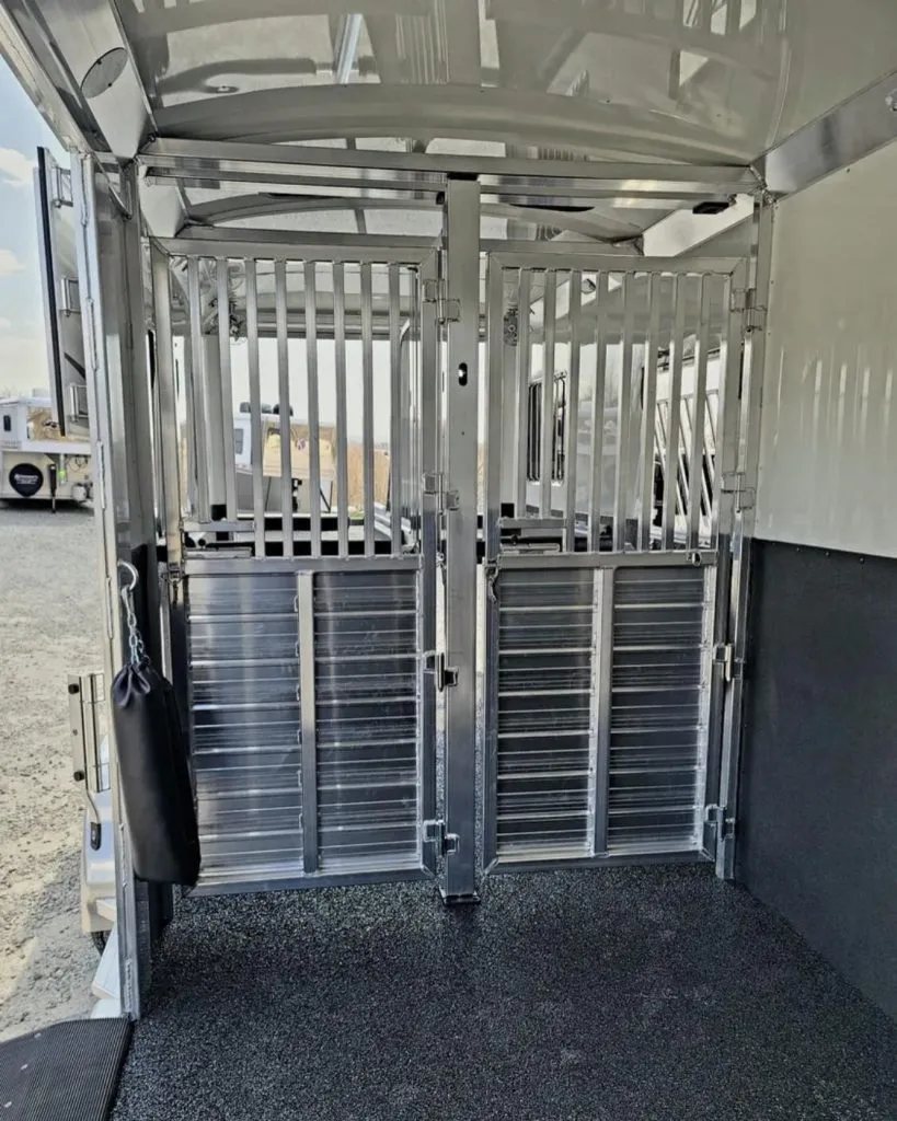 2023 4 Star 23 ft Horse Trailer – 2+1 Gooseneck – View of the interior metal gate dividers looking toward the front