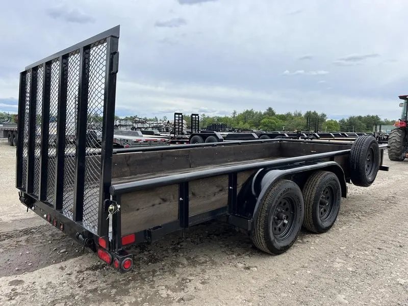 2021 Big Tex 16 ft Utility Trailer – Ramp Gate & Spare – Rear three-quarter view showing the high mesh gate in the upright position