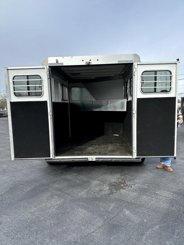 2021 Titan 2 Horse Bumper Pull Trailer – White, Slant Load – Rear view of trailer with double doors open revealing interior stall