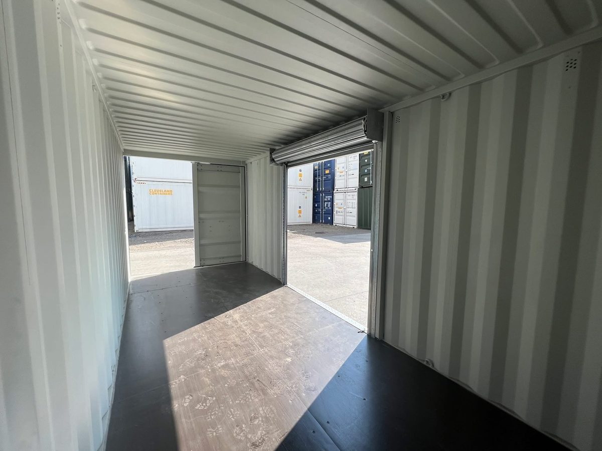 20ft Refurbished Shipping Container – Roller Shutter Access – empty container interior with open side roller shutter