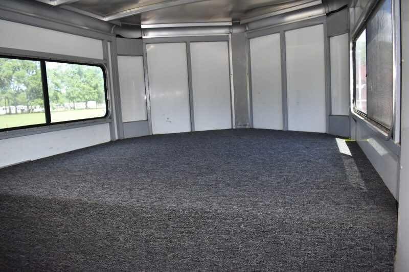 2000 Sundowner 2 Horse Gooseneck Trailer – Dressing Room – A wide interior view of the carpeted front dressing area