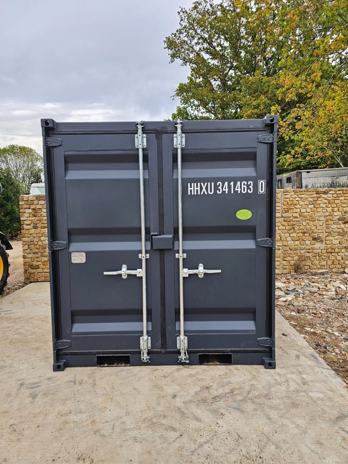 8ft New Shipping Container – Lockbox and Barred Windows – front view of closed container doors with locking bars
