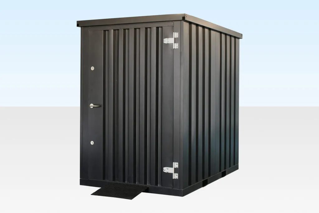 Flat Pack Steel Garden Store – Shelving And Retractable Ramp – three-quarter exterior view of steel shed with closed door