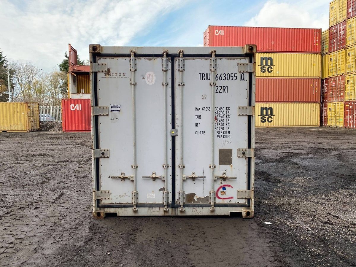20ft Used Reefer Container – Wind & Watertight – closed rear doors of weathered refrigerated container in yard