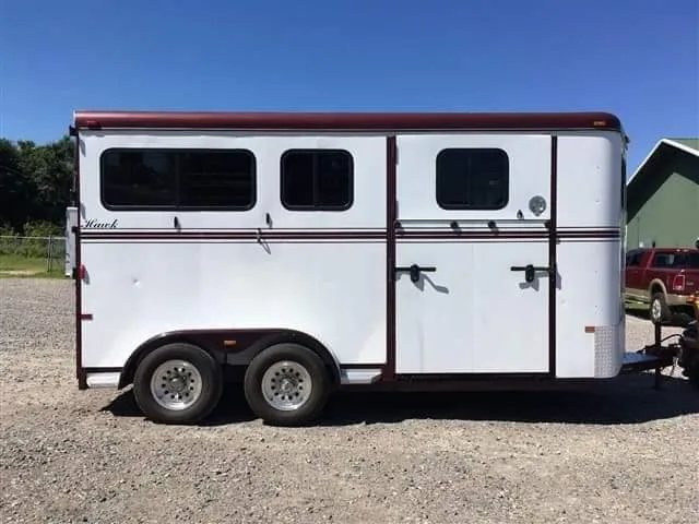 2007 Hawk 2 Horse Bumper Pull Trailer – Side Ramp – The driver side exterior profile showing windows and access doors