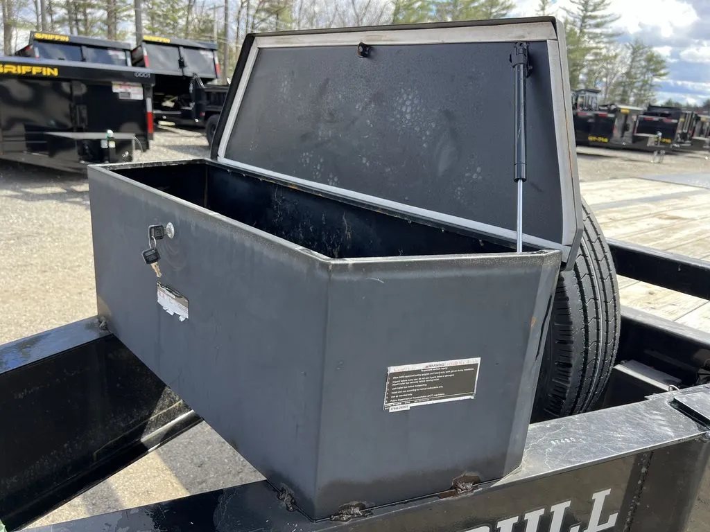 2022 Iron Bull Trailers Equipment Trailer – Rampage Ramps – Open black metal tool box mounted on the front of the trailer frame