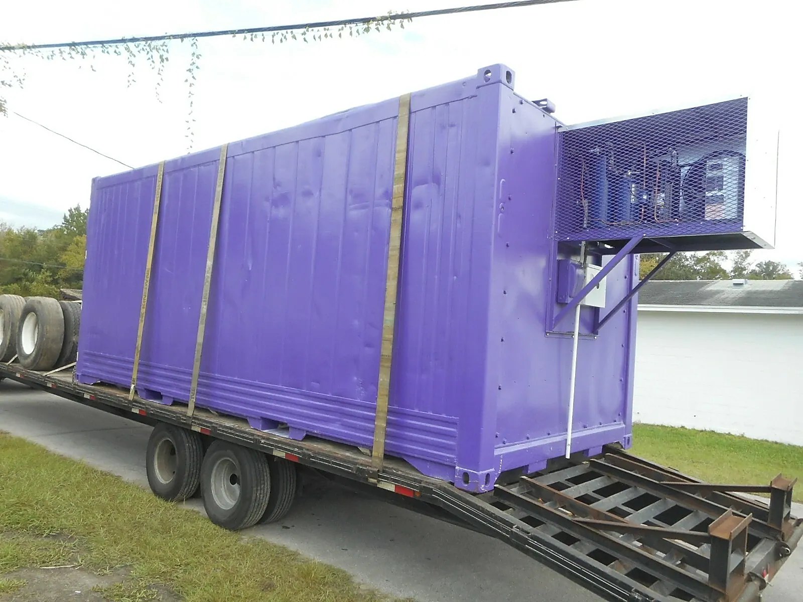 20ft Refurbished Cold Storage Container – Freezer/Cooler – Purple cold storage container with refrigeration equipment on trailer