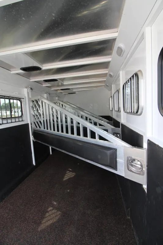 2019 Trails West 4 Horse Trailer – Convenience Package – Close-up of the metal horse stall divider with padding and latch