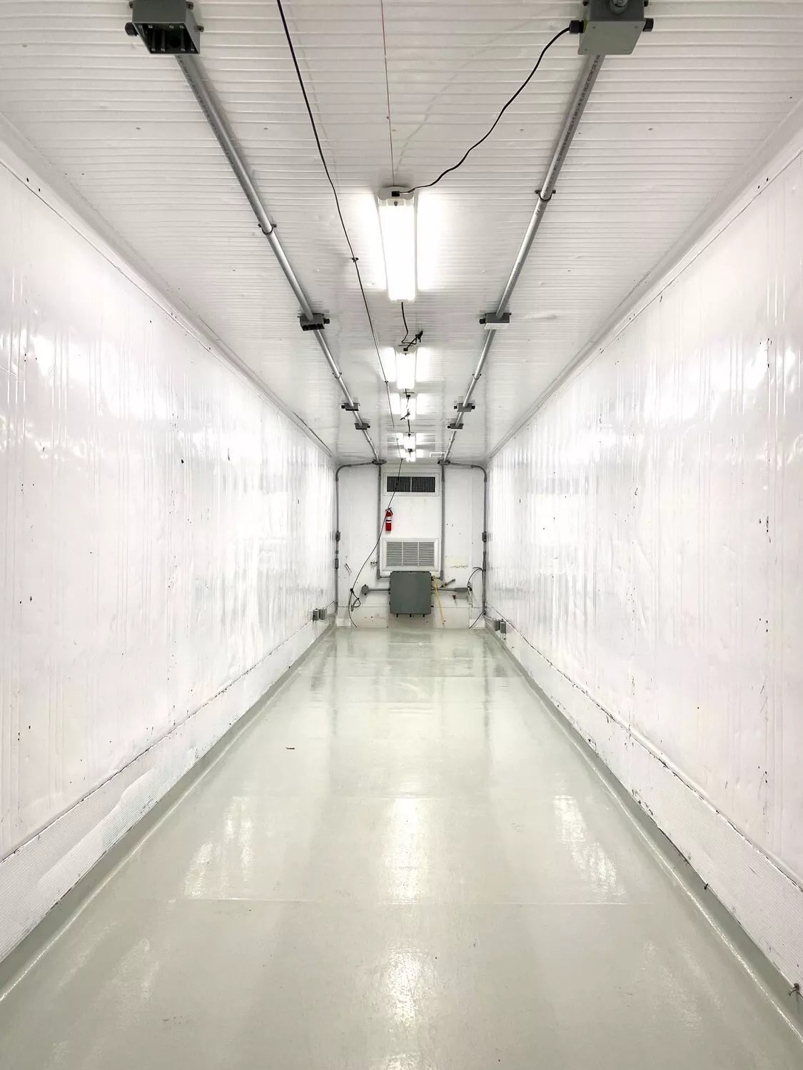 40ft High Cube Insulated Container – Lighting and Electrical – empty insulated container interior with overhead lights and ventilation grilles