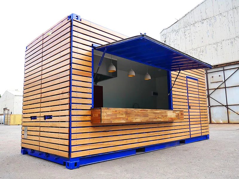 Shipping Container Kitchen – Insulated, Lockable – Blue container with horizontal wood slat cladding and open service hatch