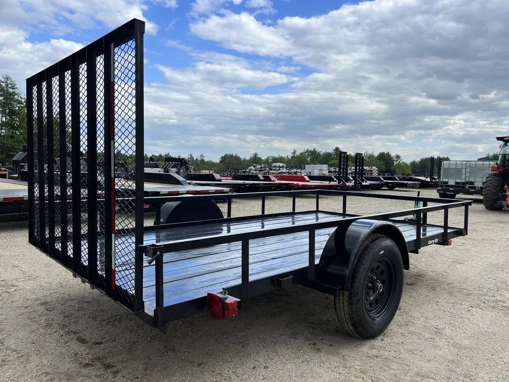 2024 Carry-On 12 ft Utility Trailer – Rear Ramp Gate – Rear three-quarter view from the left side showing the mesh gate upright