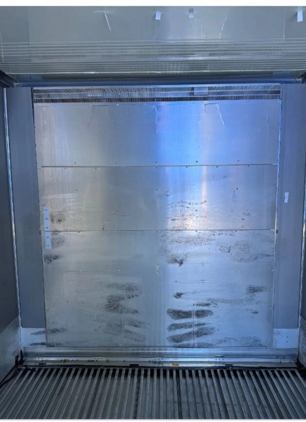 20ft Used Refrigerated Shipping Container – Thermo King – empty refrigerated container interior with scuffed metal wall and ribbed floor