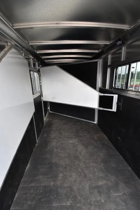 2021 Shadow 3 Horse Trailer – Fold-In Tack Wall – Interior horse stall area with padded dividers and rubber mats on the floor