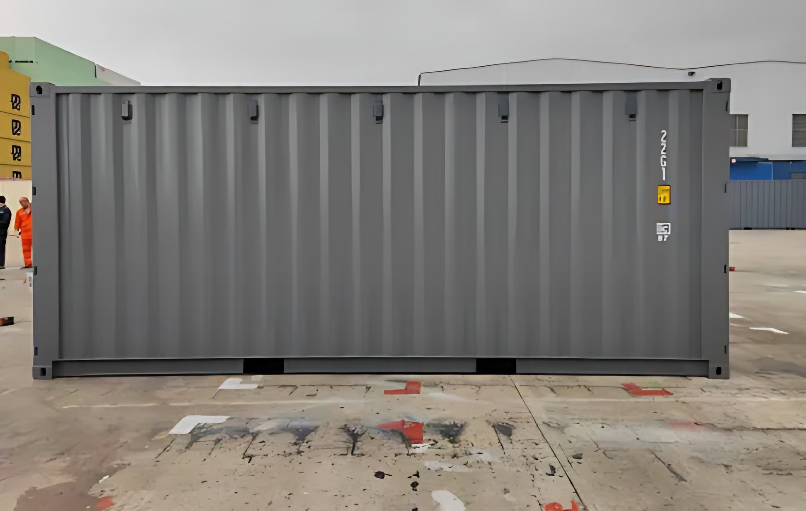 20ft High Cube Shipping Container – Double-End Doors – straight side view of gray container in industrial yard