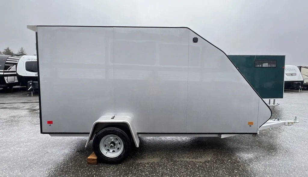 2024 Mission Trailers Crossover Trailer – Galvanized Package – Full side view of the driver side of the silver trailer