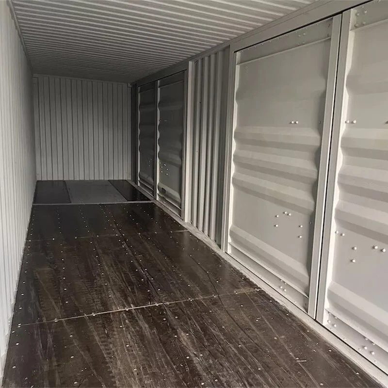 40ft High Cube Shipping Container – 4 Side Doors + End Access – empty container interior with closed side doors and dark flooring