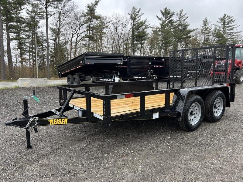 2024 Reiser Trailers 12 ft Landscape Trailer – Ramp Gate – Front three-quarter view from the opposite side showing the trailer hitch and wooden floor