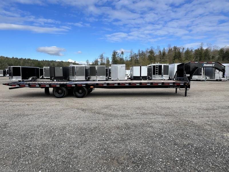 2024 Diamond C 35 ft Equipment Trailer – Auto Dovetail – Long side profile of the trailer showing the dual axles and deck
