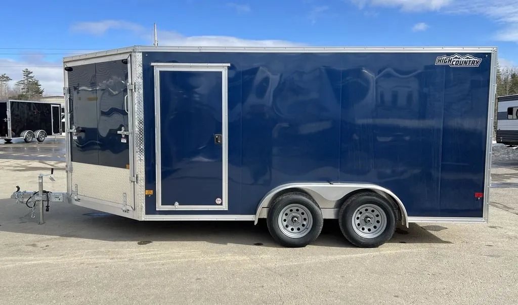 2023 High Country 14 ft Trailer – Blue, Drive-Through – Full side view of the trailer showing the blue finish and side door