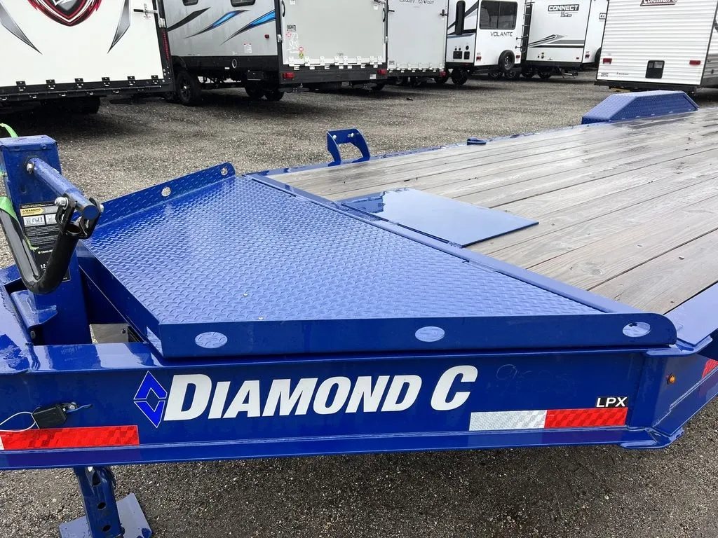 2022 Diamond C 24 ft Equipment Trailer – Max Ramps – Top view of the closed front storage toolbox with diamond plate lid