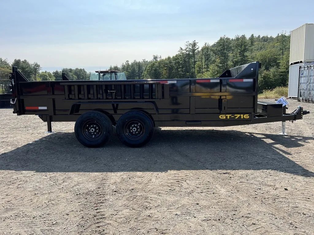 2024 Griffin Trailers 16 ft Dump Trailer – Telescopic – A straight-on side profile view of the driver side of the trailer