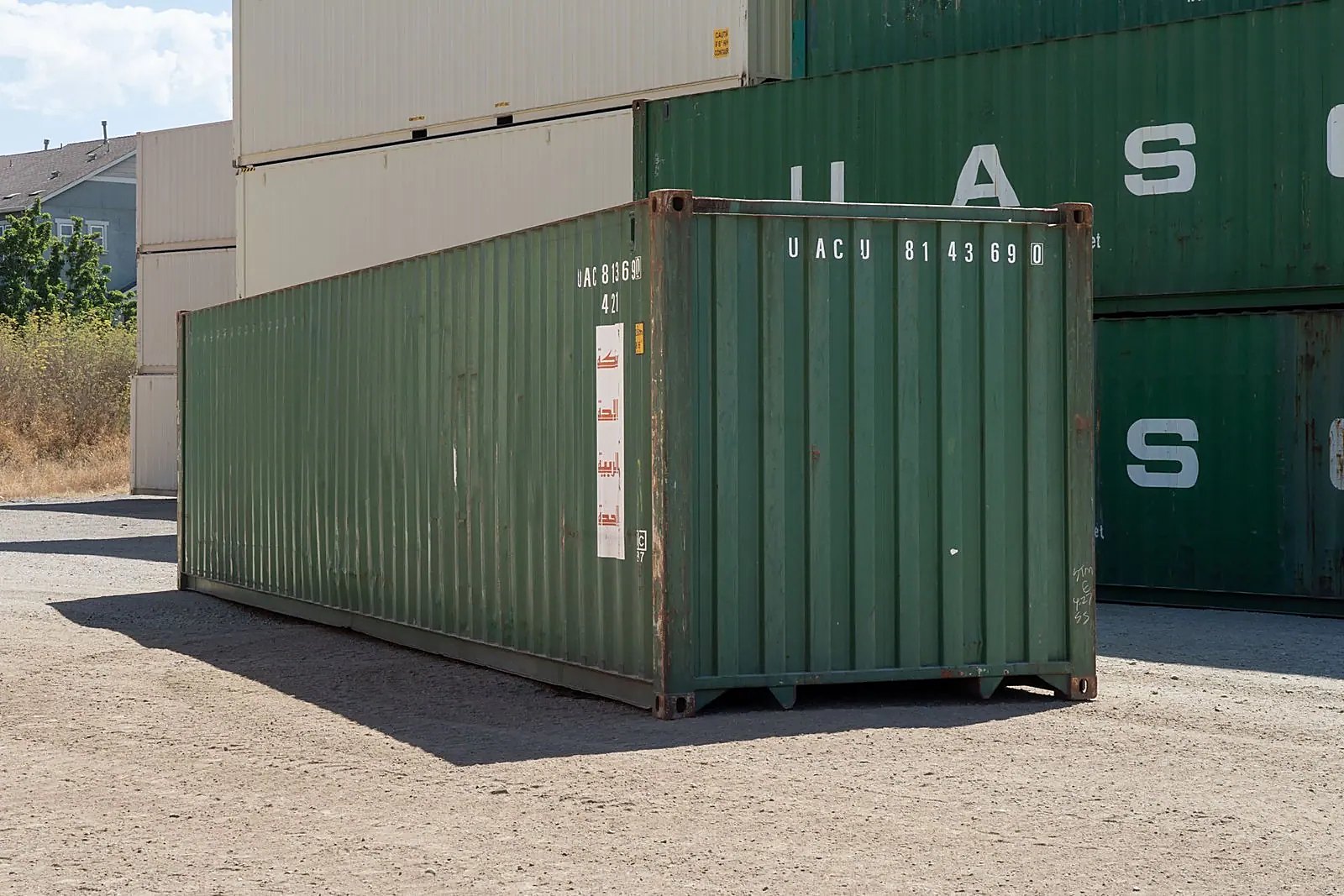 40ft Used Shipping Container – Standard Height, Storage Grade – three-quarter exterior view of weathered container with solid end
