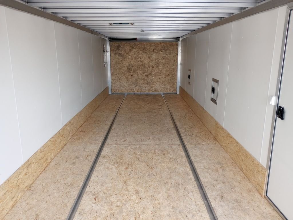 2024 Mission Trailers 24 ft Deckover – Galvanized Package – Full interior view showing wooden flooring and white walls looking toward the front