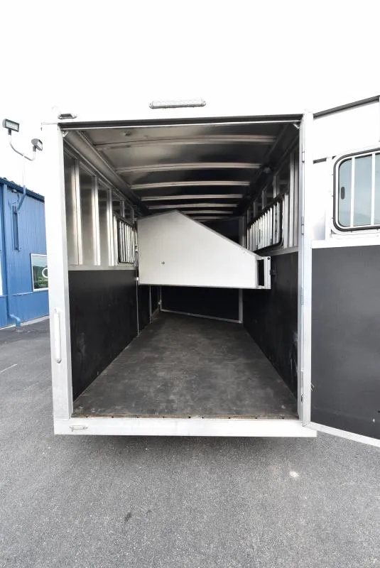2021 Shadow 3 Horse Trailer – Fold-In Tack Wall – Looking through the rear opening into the horse stalls of the trailer