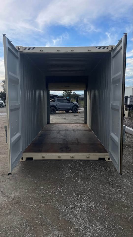 20ft High Cube Shipping Container – Rear Rollup Door – open cargo doors revealing empty interior and opposite rollup doorway