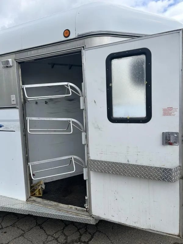 2000 Morgan Built 3 Horse Trailer – Bumper Pull – The open side entry door leading into the tack storage area