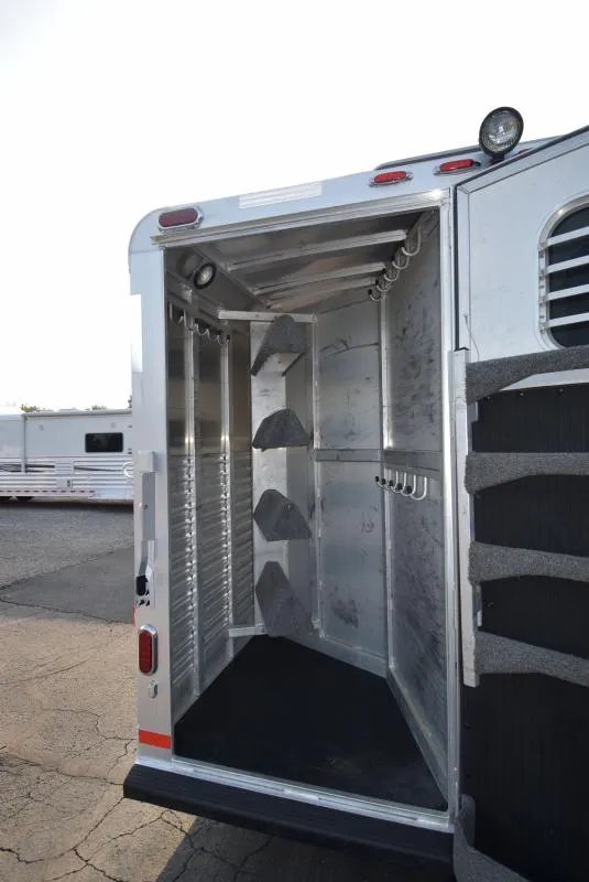2008 C and C Trailers 4 Horse Bumper Pull – Hay Pod – Rear corner tack room with multiple tiered saddle racks and hooks