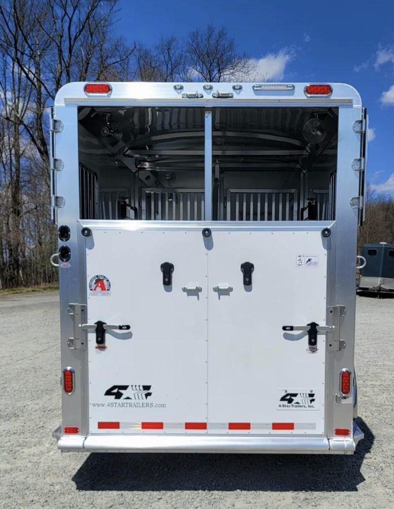 2023 4 Star 23 ft Horse Trailer – 2+1 Gooseneck – Direct rear view of the closed double trailer doors with manufacturer branding